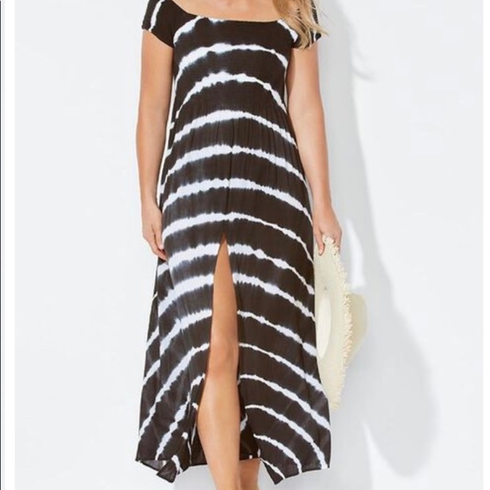 Woman within swimsuit cover up, maxi dress